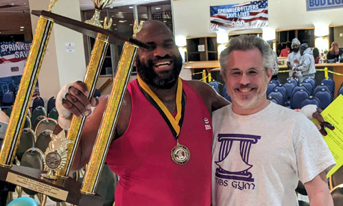Boxing champions with championship belts